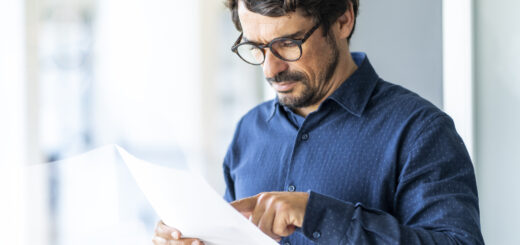 Man-reading-a-paper
