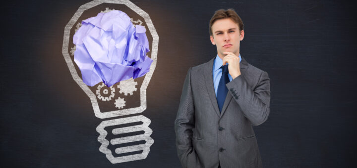 29337634_composite-image-of-thinking-businessman