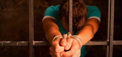 Man-with-hands-tied