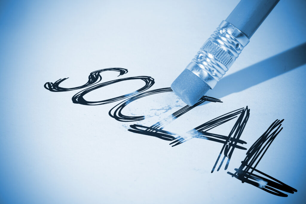 pencil-erasing-the-word-social-scaled