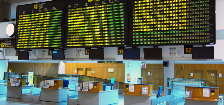 flights-information-board-in-airport-scaled.j