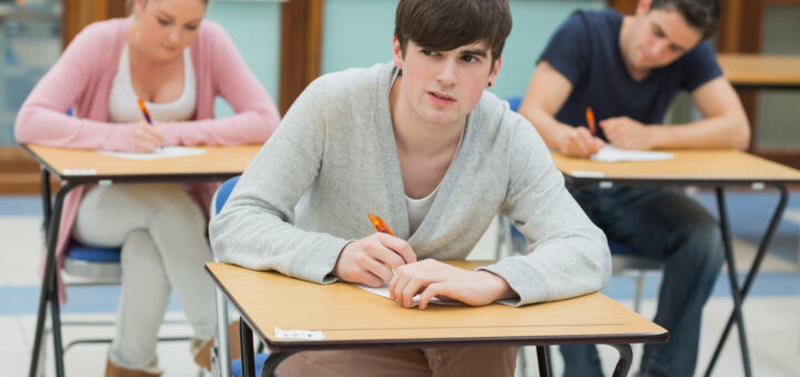thoughtful-student-writing-scaled
