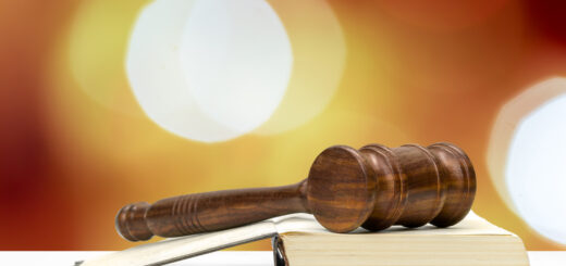 judges-gavel-on-light-background-front-view-law-concept-scaled