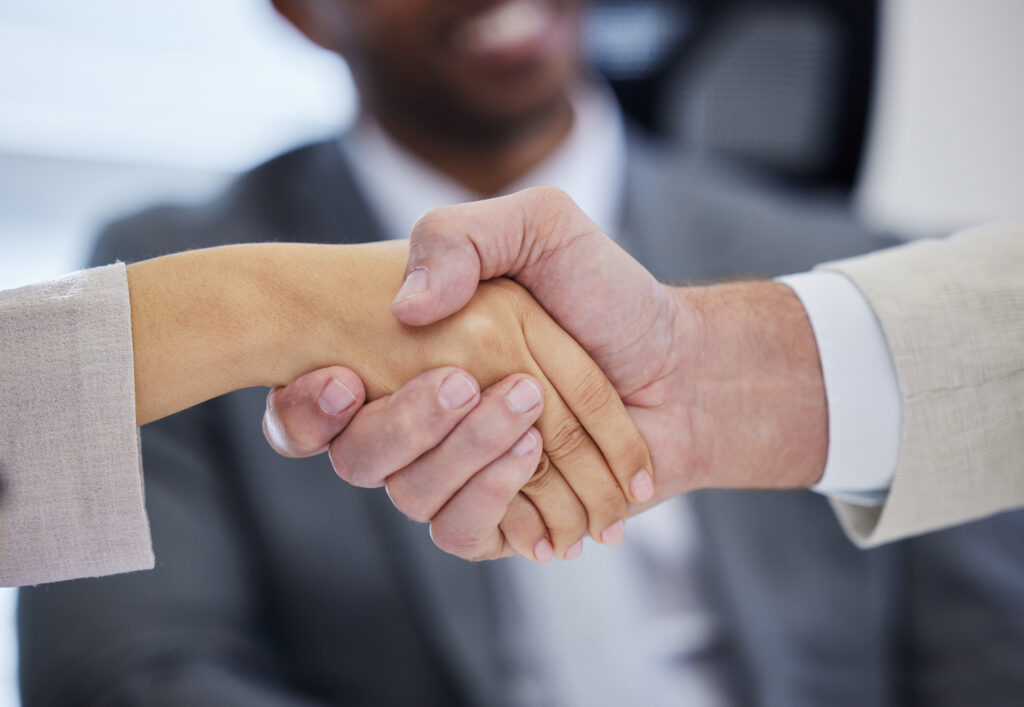 see-where-good-negotiation-skills-gets-you-unrecognisable-businesspeople-shaking-hands-in-a-modern-office-scaled