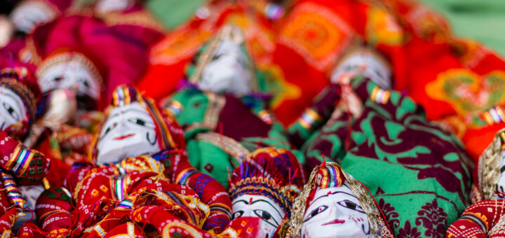white_red_and_green_ceramic_mask