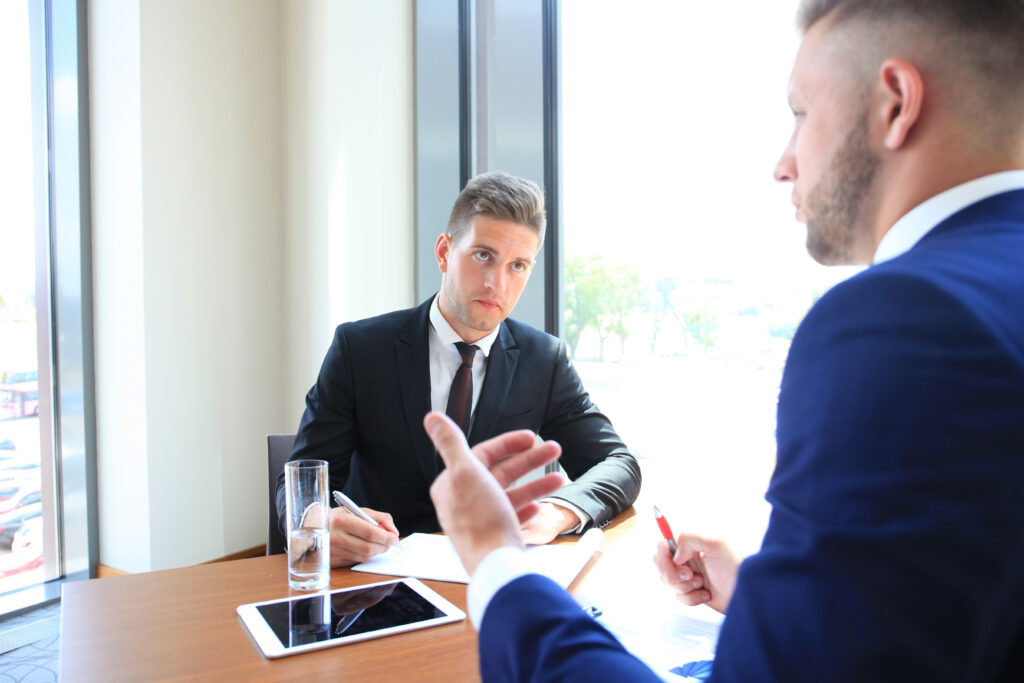 recruiter-checking-the-candidate-during-job-interview-scaled