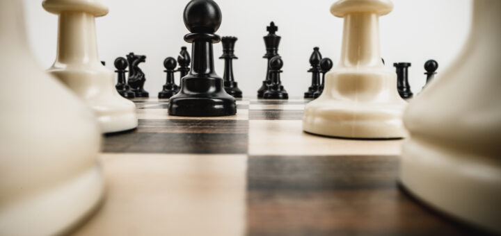 macro-photo-of-chess-pieces-on-a-chess-board-scaled