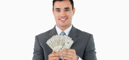 usinessman-with-money-scaled