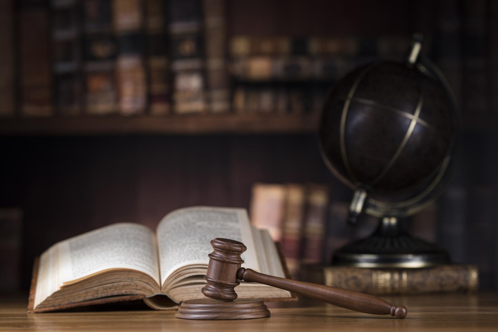 justice-scale-and-gavel-globe-concept