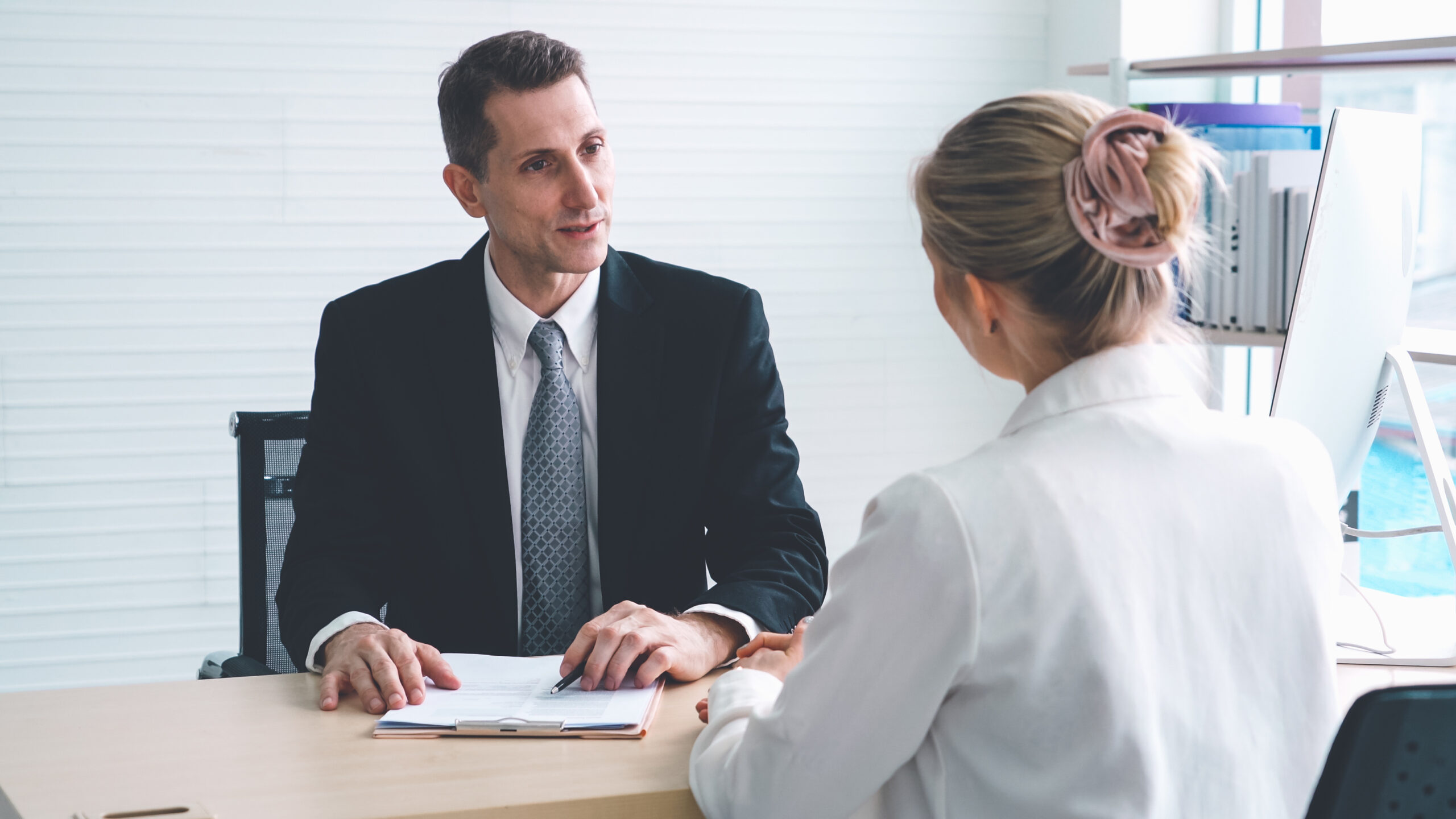 job-seeker-in-job-interview-meeting-with-manager-scaled