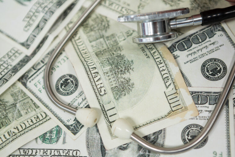 stethoscope-on-currency-note-scaled