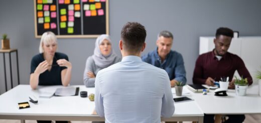 man-sitting-at-interview